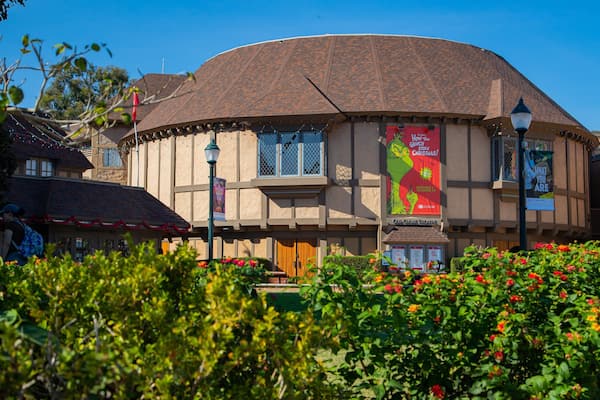 Old Globe Theater featuring a garden and wildflowers