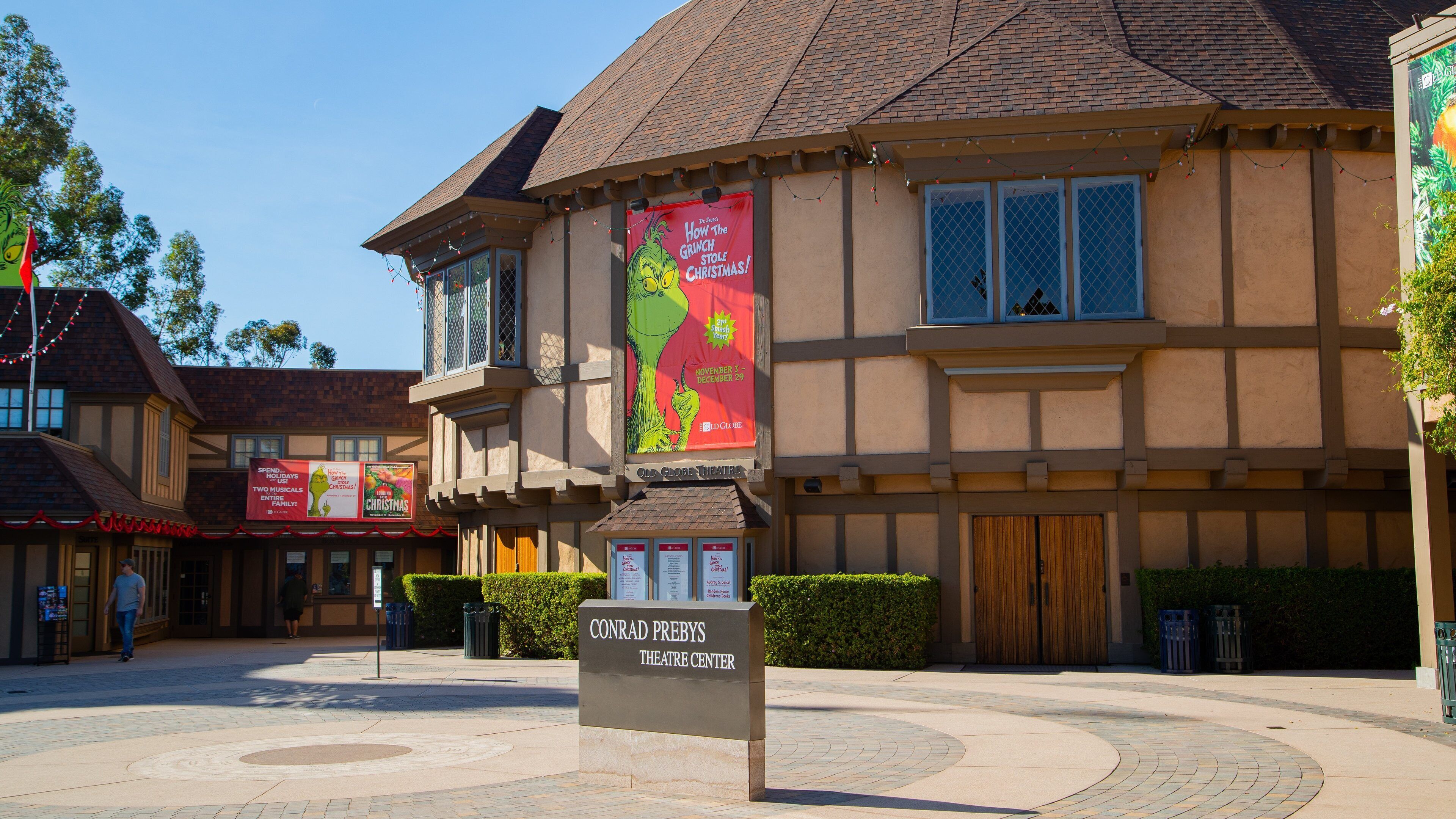 Old Globe Theater featuring signage