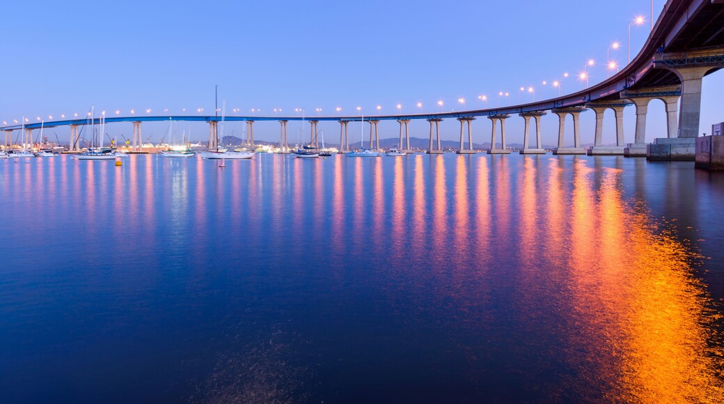 Coronado Bridge at Dusk - A close-up dusk view of Coronado Bridge, winding over calm San Diego Bay, at San Diego, California, USA.
