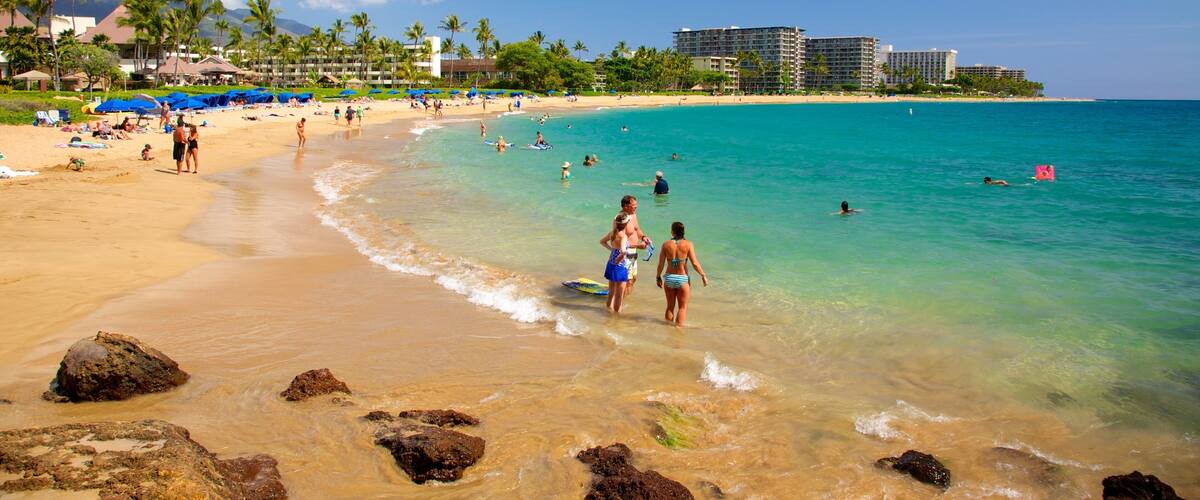 Kaanapali Beach showing swimming, a sandy beach and general coastal views