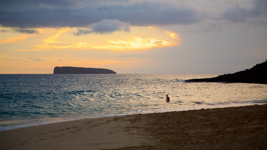 Makena Beach State Park which includes general coastal views, a sunset and a beach