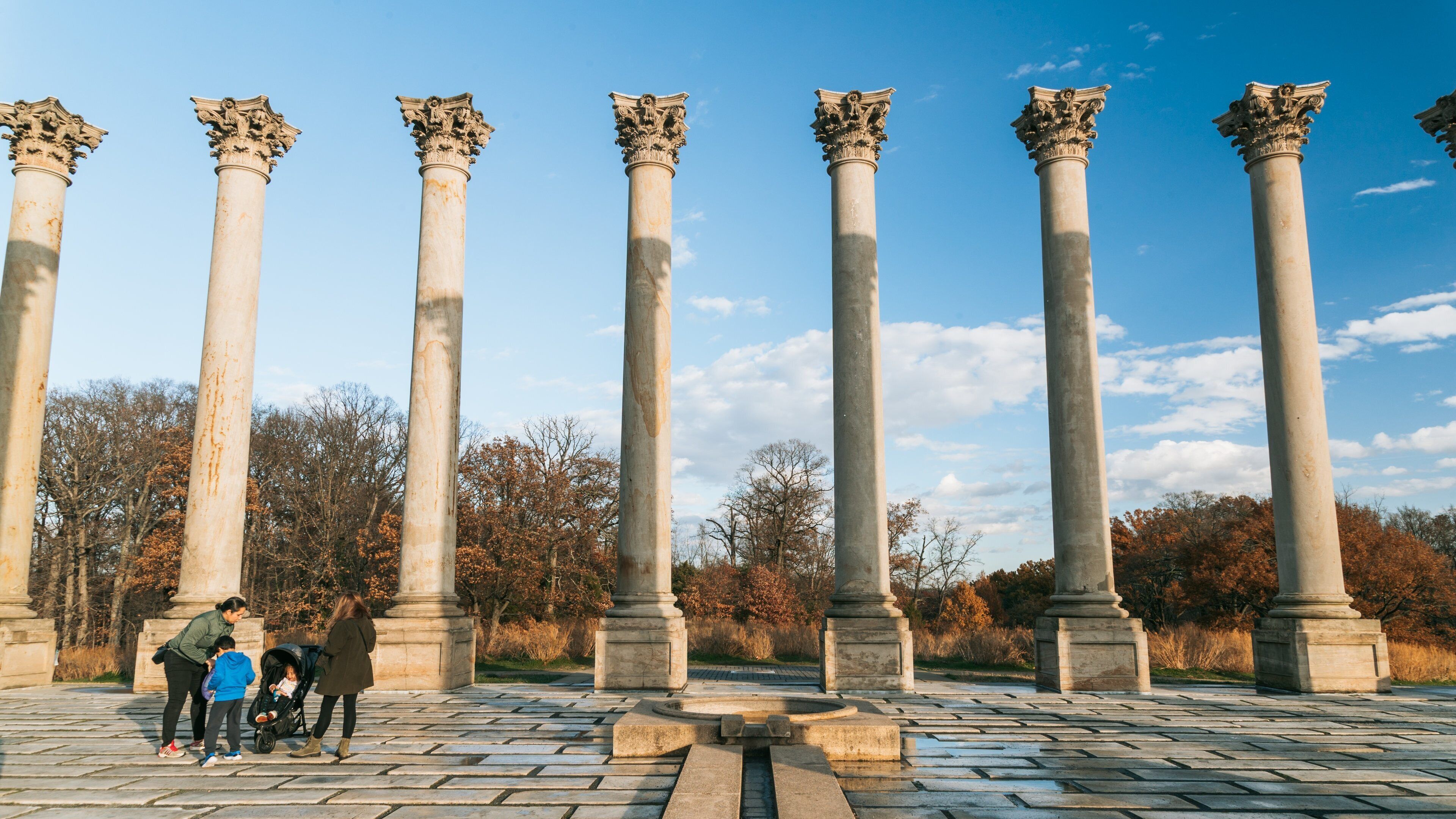 U.S. National Arboretum featuring a monument and heritage elements as well as a family