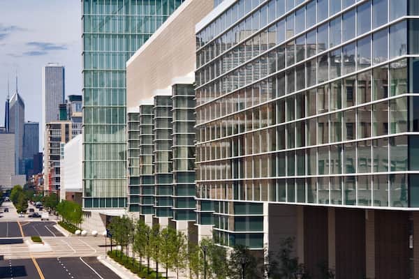 McCormick Place showing a high rise building and a city