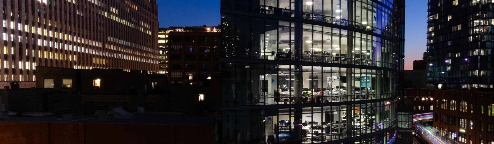 Night photography of Chicago El from near the Merchandise Mart.