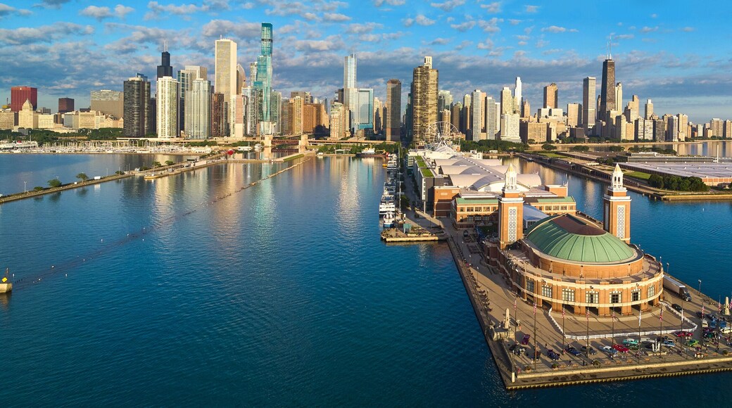 Stunning panorama of entire Navy Pier on Lake Michigan in Chicago with skyline during morning light