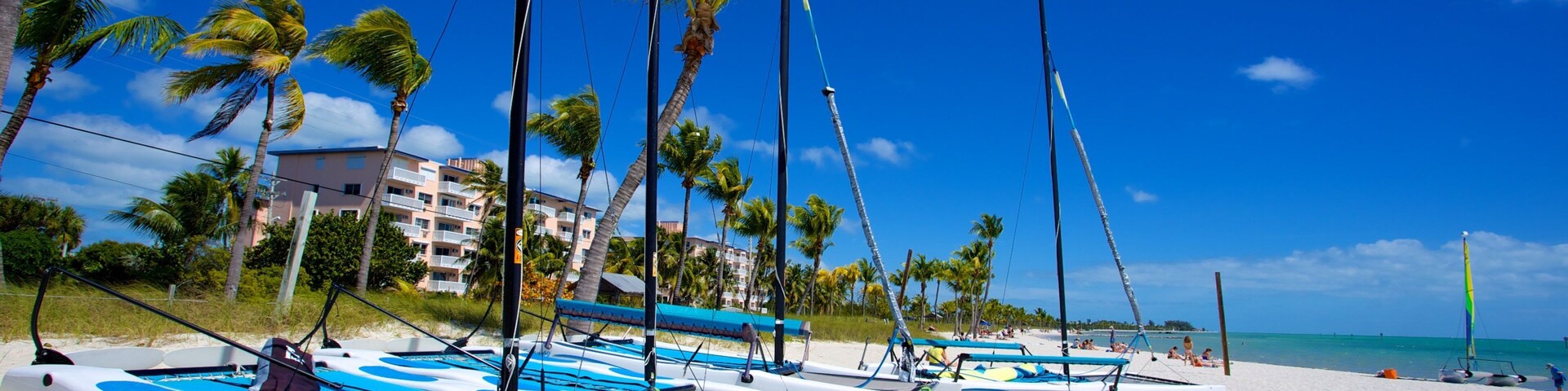 Smathers Beach showing tropical scenes, boating and a sandy beach