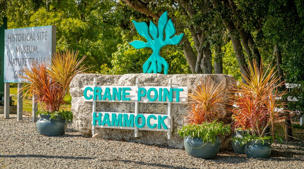 Crane Point Museum and Nature Center showing a garden and signage