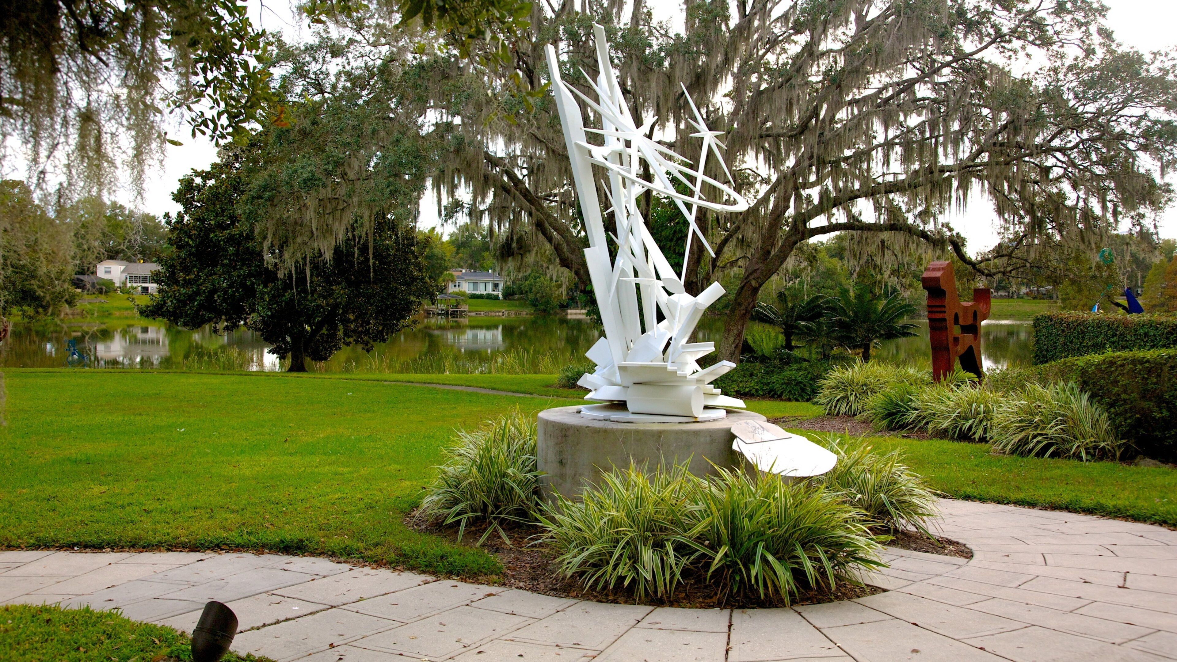 Loch Haven Park featuring outdoor art and a garden