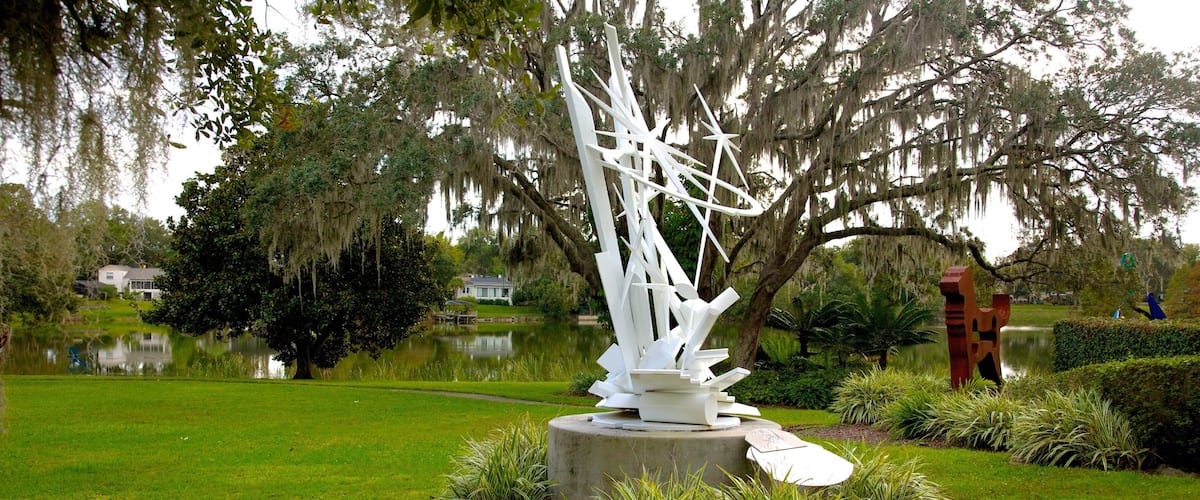 Loch Haven Park featuring outdoor art and a garden