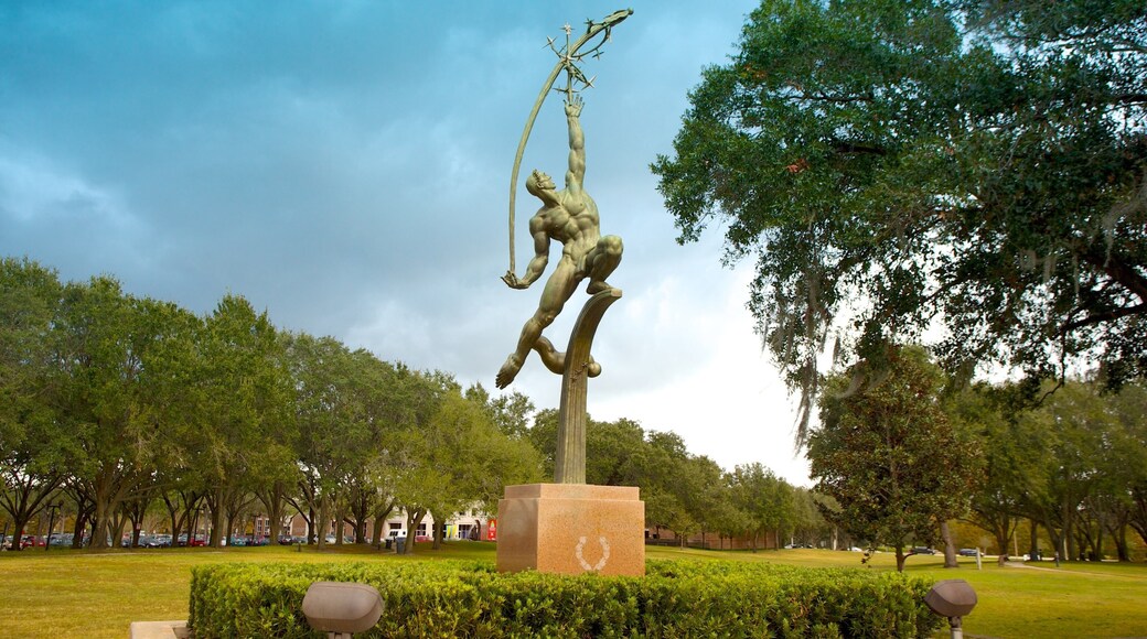 Loch Haven Park showing a garden, a monument and a statue or sculpture