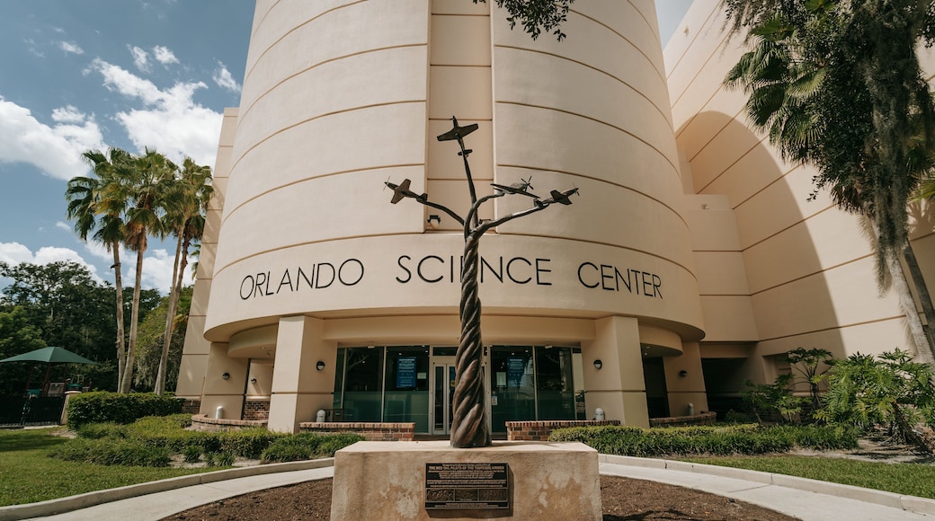 Orlando Science Center featuring signage and outdoor art