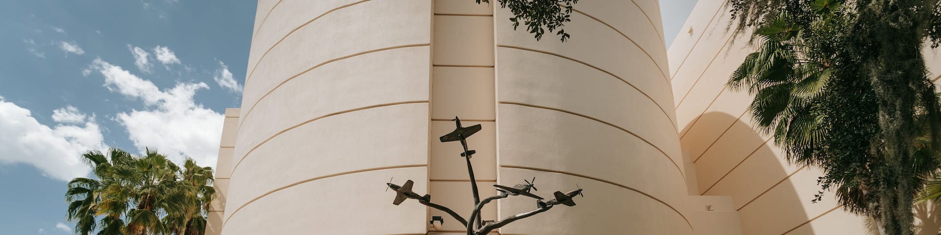 Orlando Science Center featuring signage and outdoor art