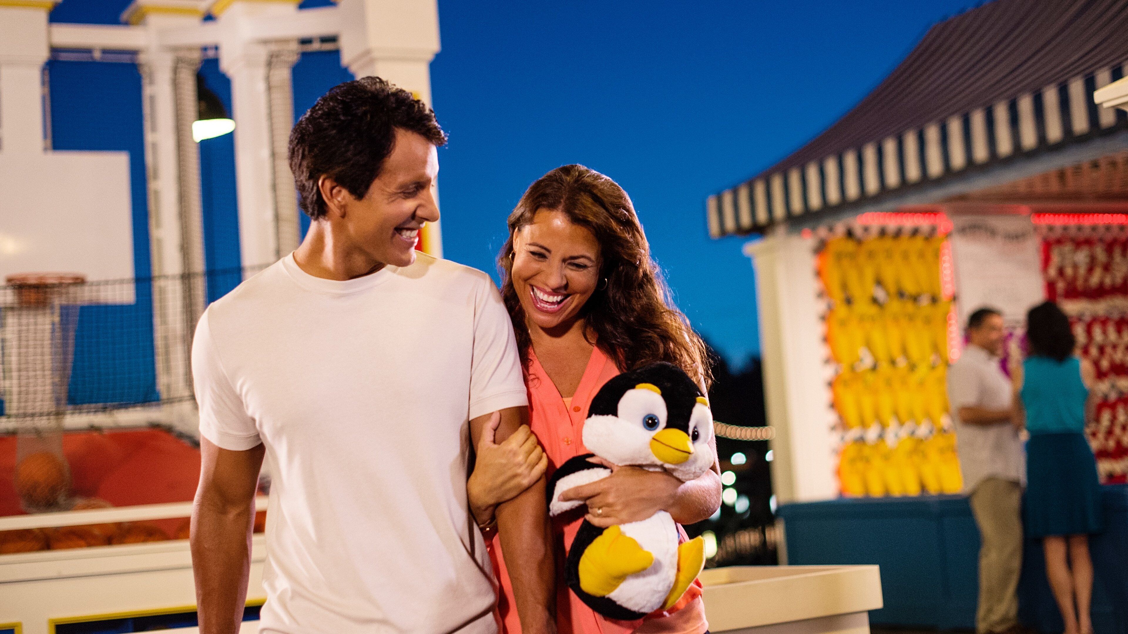 Disney\'s Boardwalk featuring street scenes and night scenes as well as a couple