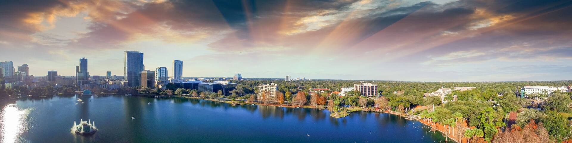 Orlando aerial view, skyline and Lake Eola at dusk