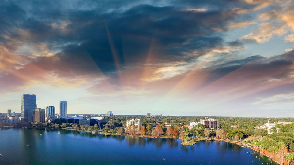 Orlando aerial view, skyline and Lake Eola at dusk