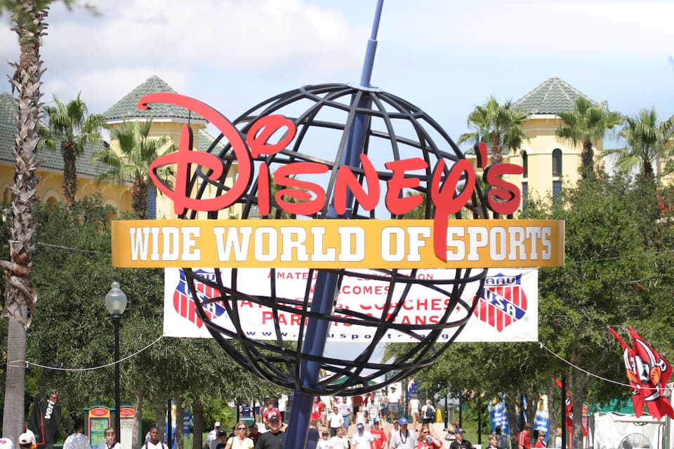 A sign with 'Disney's Wide World of Sports' and 'All-Star Games' logos.