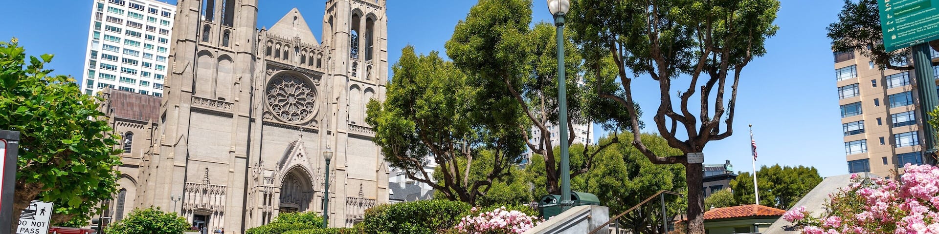 Grace Cathedral showing a church or cathedral, flowers and heritage architecture