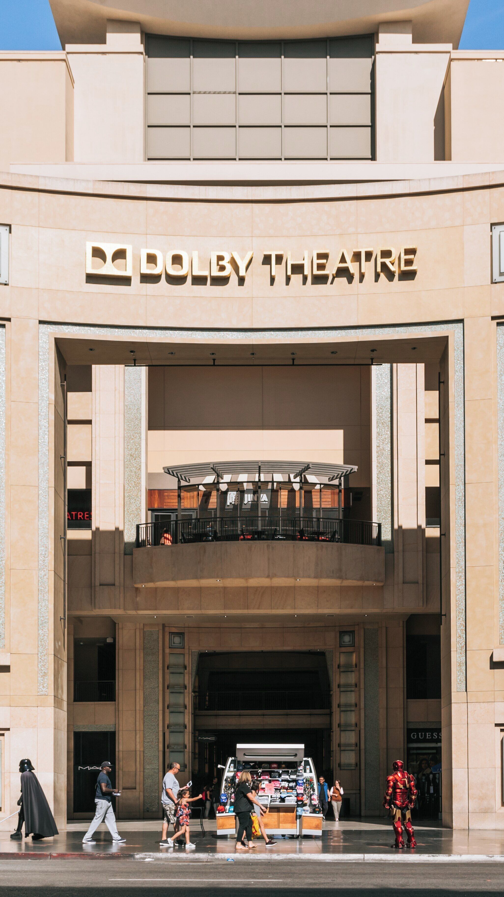Enjoying the lively atmosphere outside Dolby Theater in Hollywood, California with visitors and iconic characters in view