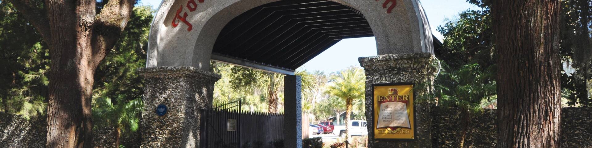 An archway with the words "Fountain of Youth" and a sign that says "ENTER".