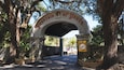 An archway with the words "Fountain of Youth" and a sign that says "ENTER".
