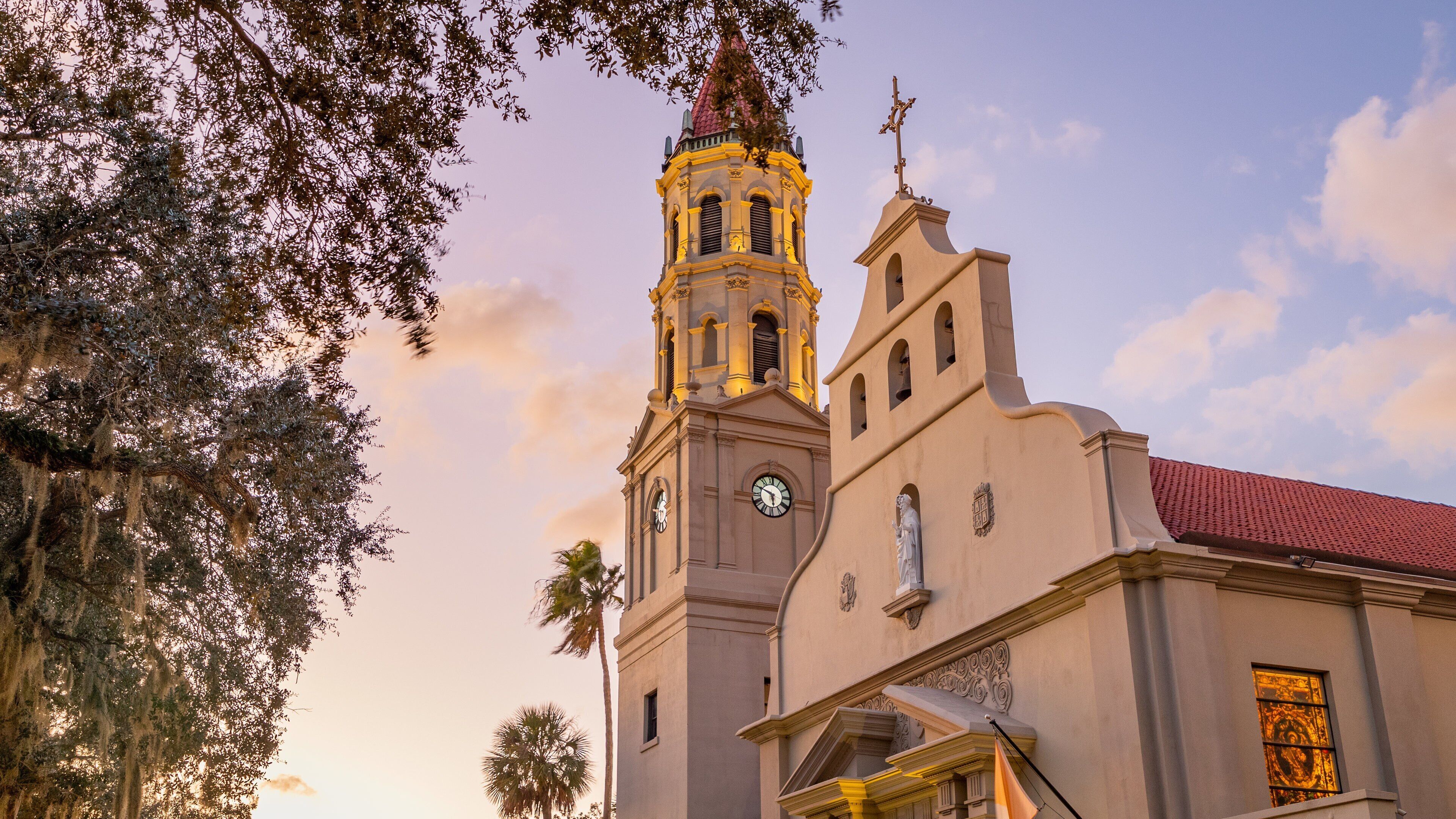 Cathedral Basilica of St. Augustine which includes heritage architecture, a sunset and a church or cathedral