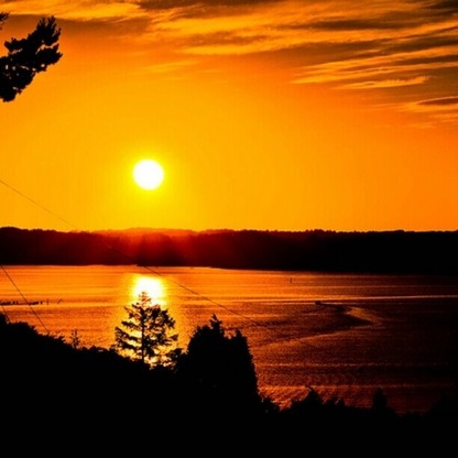 The big island of Orust in the Swedish western archipelago is famous for its many pretty havens and fishing villages. Here, at Morlanda, is where yours truly spends his summers watching this sunset night after night.
