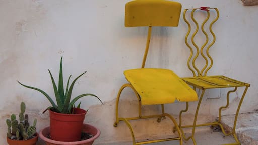 Yellow chairs. Serrano is a town of 1,406 inhabitants of the Province of Lecce, in Apulia, southern Italy. It is a frazione of the comune of Carpignano Salentino and is 13 km from Otranto and 29 from Lecce.