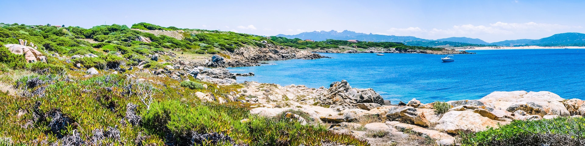 Beautiful costline with granite rocks and amazing azure water on Porto Pollo, Sardinia, Italy