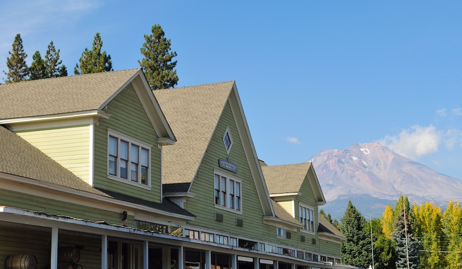 Historic company store building in McCloud, California with Mount Shasta in the  background