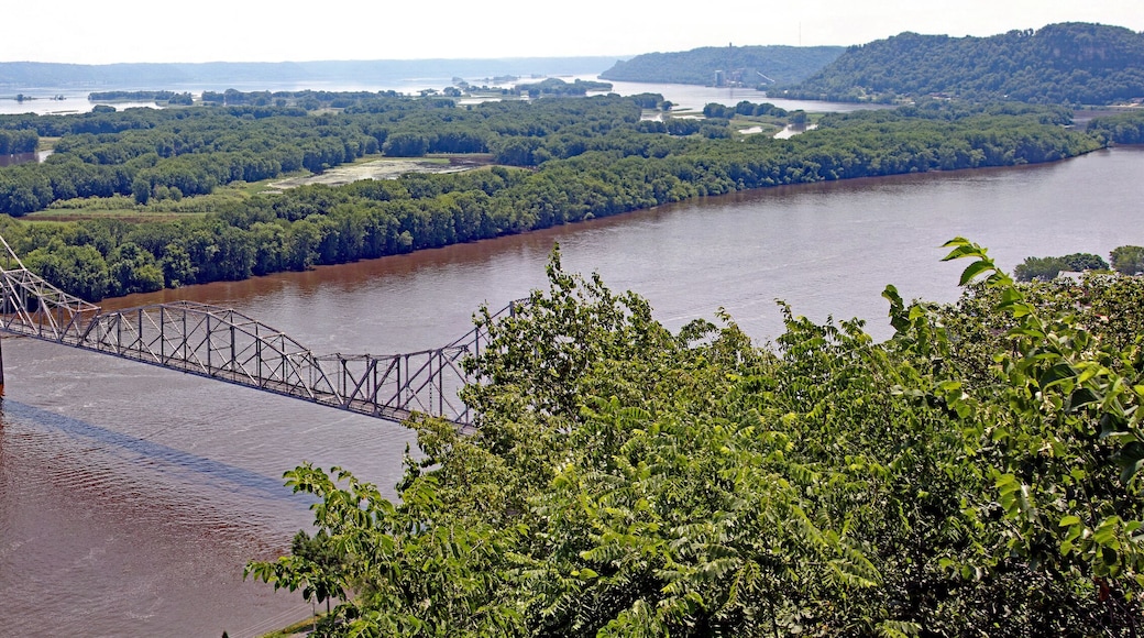 The Black Hawk Bridge spans the Mississippi River, joining Lansing IA, to WI. A riveted iron truss bridge built in 1931 from a scenic overlook mount Hosmer.