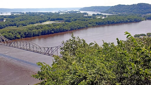 The Black Hawk Bridge spans the Mississippi River, joining Lansing IA, to WI. A riveted iron truss bridge built in 1931 from a scenic overlook mount Hosmer.