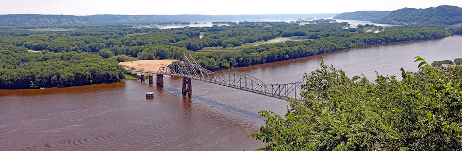 The Black Hawk Bridge spans the Mississippi River, joining Lansing IA, to WI. A riveted iron truss bridge built in 1931 from a scenic overlook mount Hosmer.