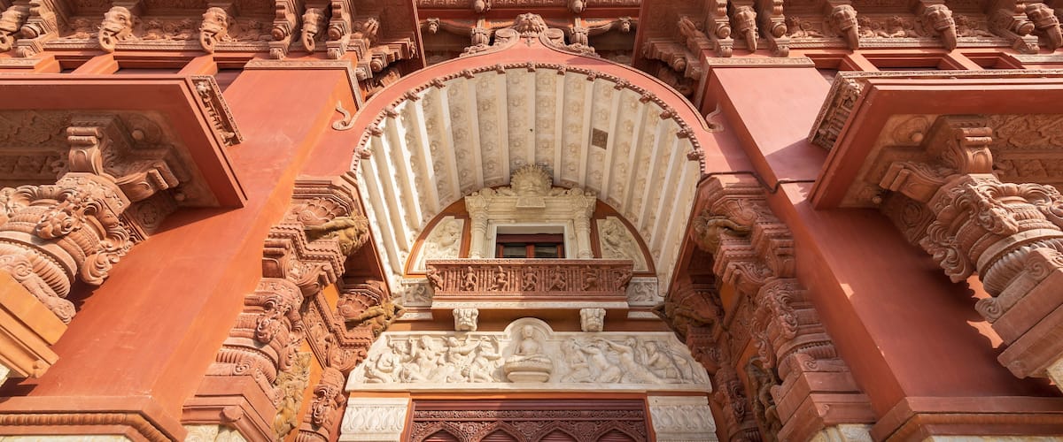 Low angle view of canopy above main entrance of Baron Empain Palace, a historic mansion inspired by the Cambodian Hindu temple of Angkor Wat, located in Heliopolis district, Cairo, Egypt
