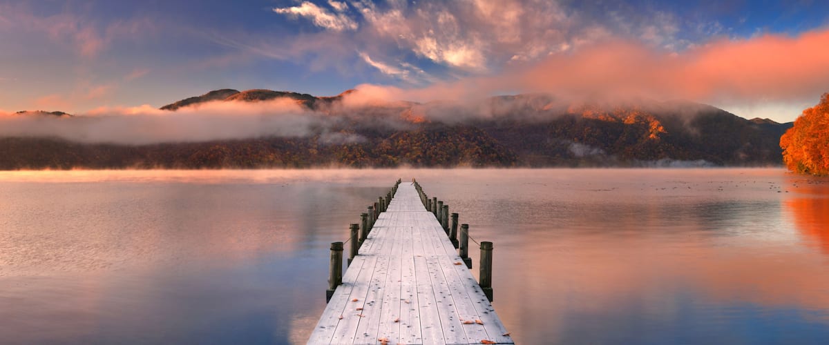 Jetty in Lake Chuzenji, Japan at sunrise in autumn