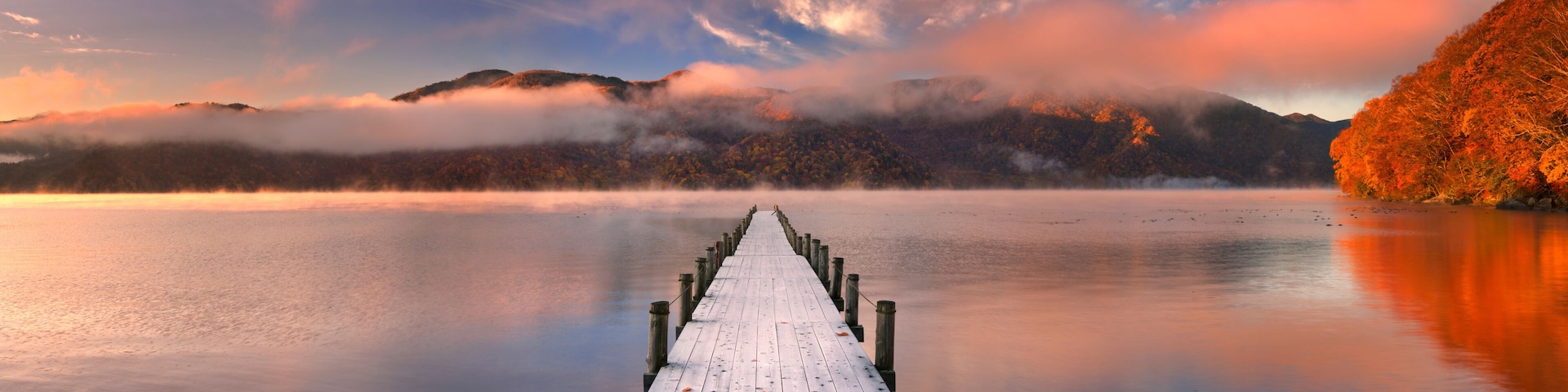 Jetty in Lake Chuzenji, Japan at sunrise in autumn