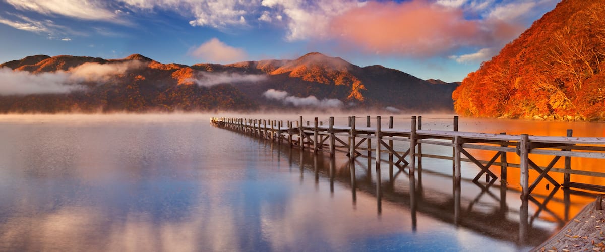 Jetty in Lake Chuzenji, Japan at sunrise in autumn