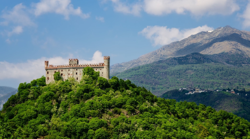 Castle of Montaldo Dora, in Canavese (Piedmont, Italy) with Alps on the background
