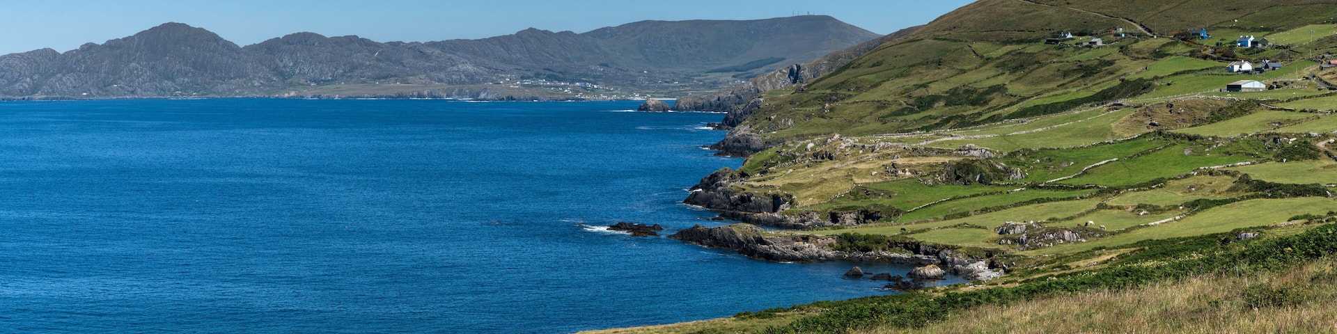 panorama view of the Iveragh Peninsula and Kells Bay in County Kerry