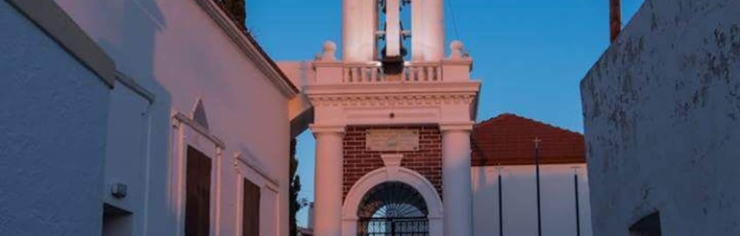 Priest entering the local church on Sunday morning, shortly before the morning service.
