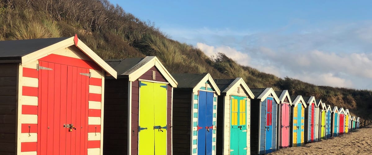 Colourful beach huts in this beautiful beach in North Devon