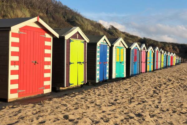 Colourful beach huts in this beautiful beach in North Devon