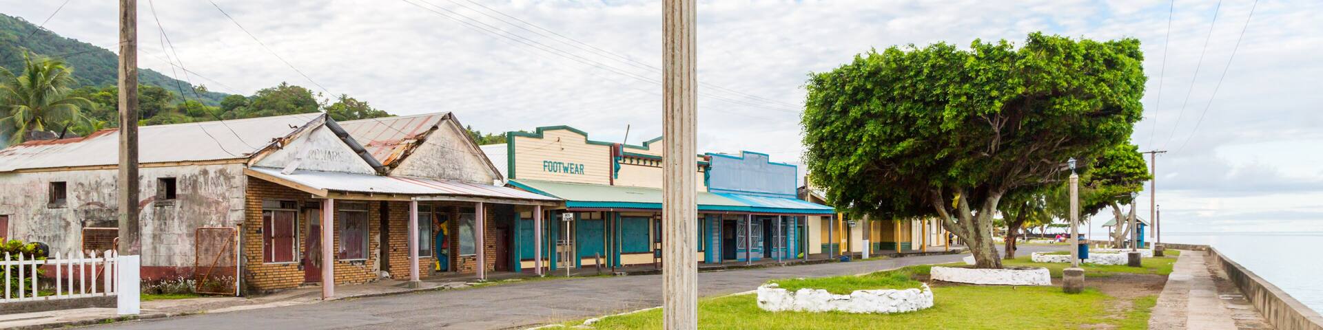 Colourful empty seafront of old colonial capital of Fiji - Levuka town, Ovalau island, Lomaiviti archipelago, Fiji, Melanesia, Oceania, South Pacific Ocean. Street light pole. UNESCO world heritage
