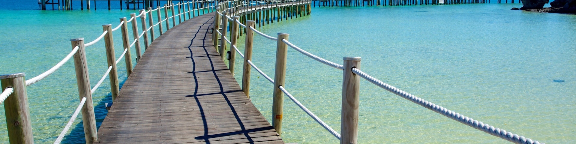 Fiji which includes views, a bay or harbour and a luxury hotel or resort