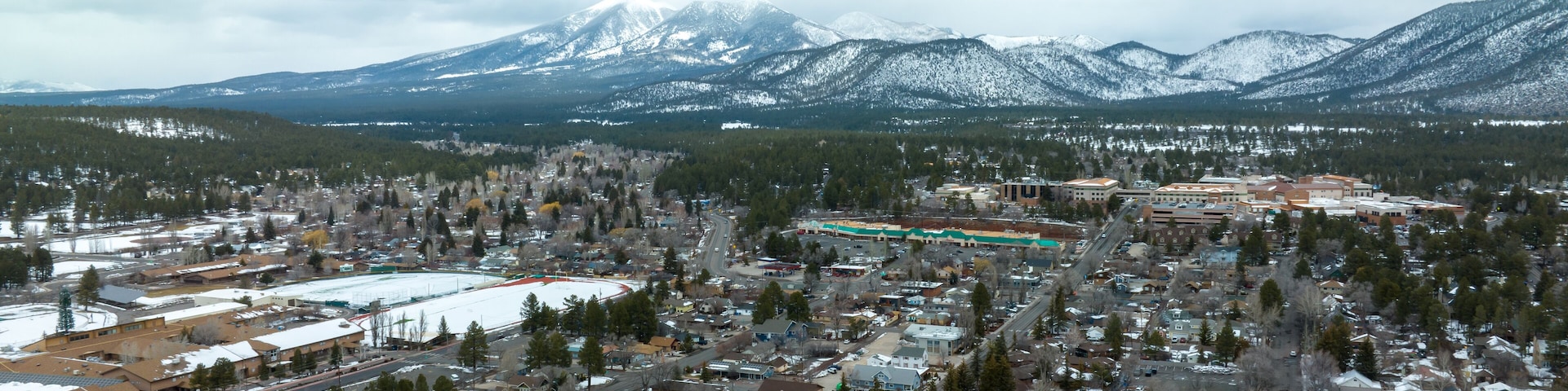 Aerial view of downtown Flagstaff after a snow storm.