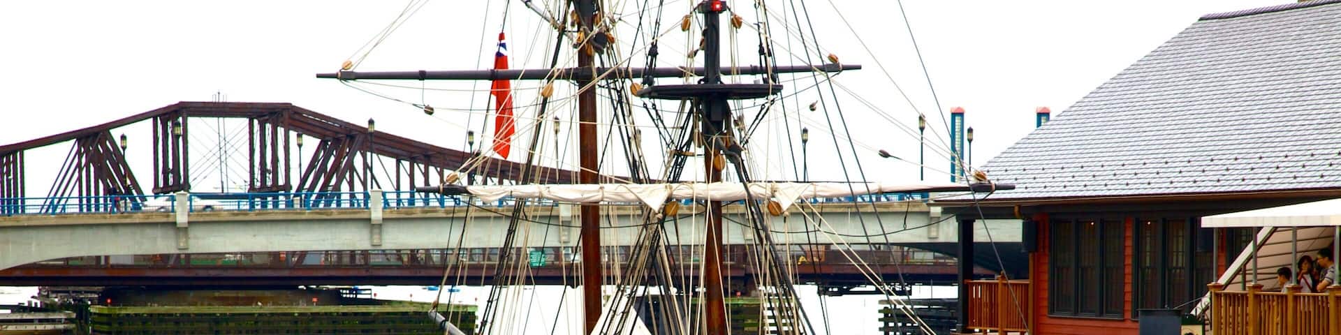 Boston Tea Party Ship which includes a bridge, boating and a bay or harbor