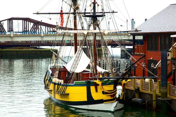 Boston Tea Party Ship which includes a bridge, boating and a bay or harbor