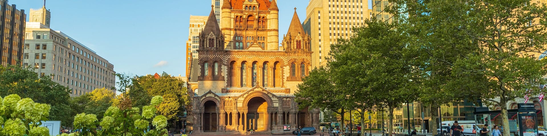 Copley Square showing a city, heritage architecture and flowers