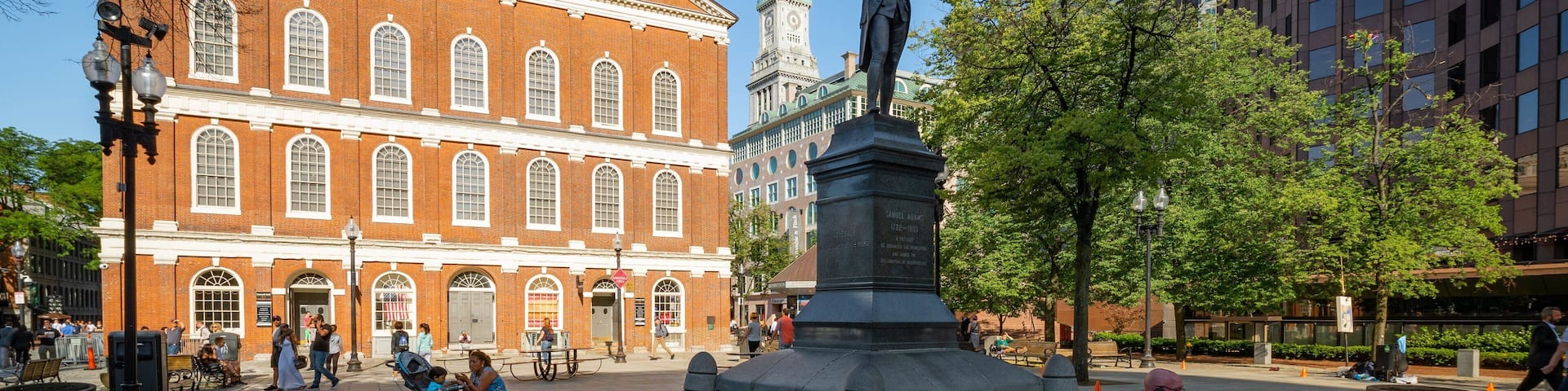 Faneuil Hall Marketplace showing a square or plaza and a statue or sculpture