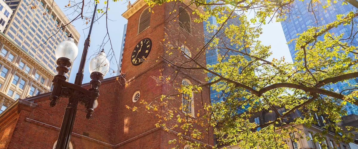 Old South Meeting House which includes heritage architecture, a sunset and a city