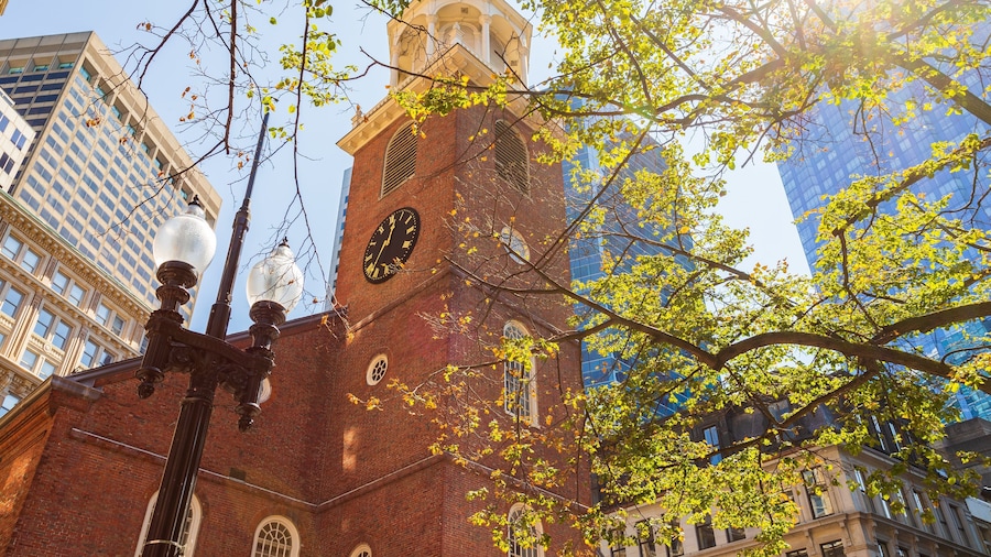 Old South Meeting House which includes heritage architecture, a sunset and a city